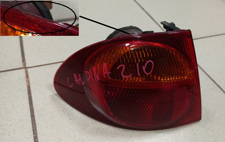 Задний фонарь TOY CALDINA 210   21-36  L [б/у] /небольшой скол/