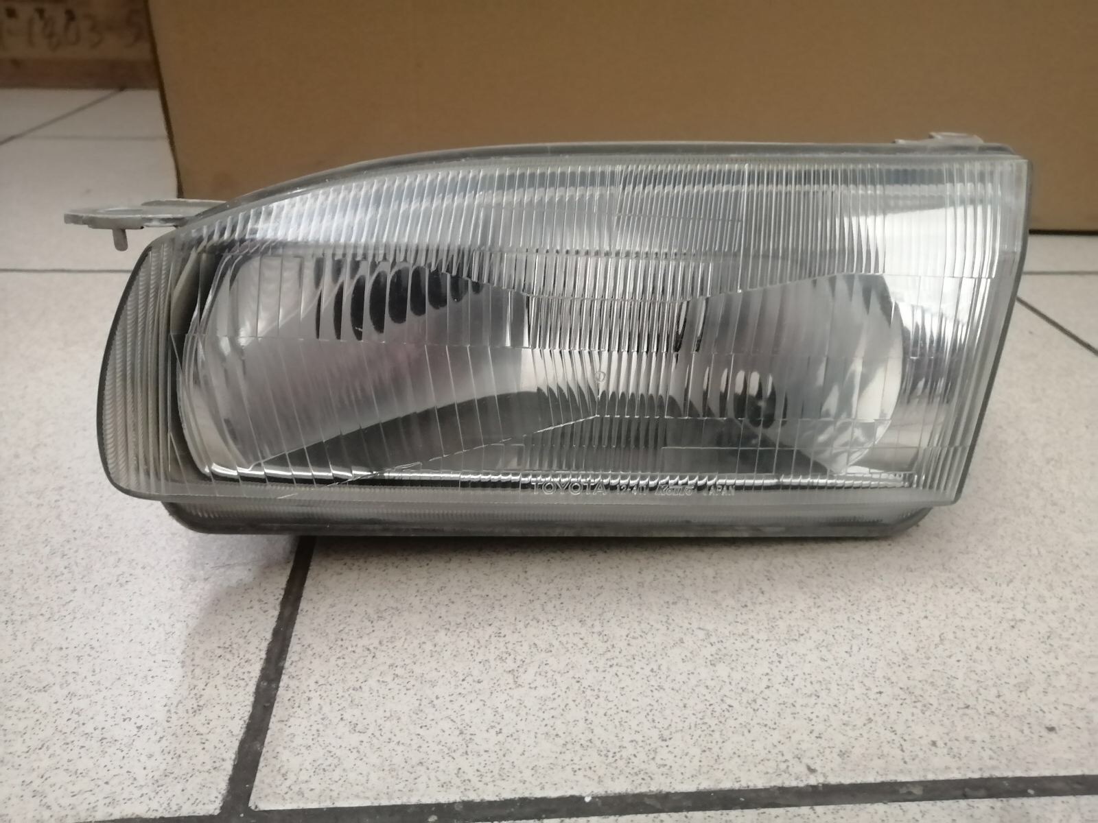 Фара TOY COROLLA 110 12-411 L  -98 [б/у]