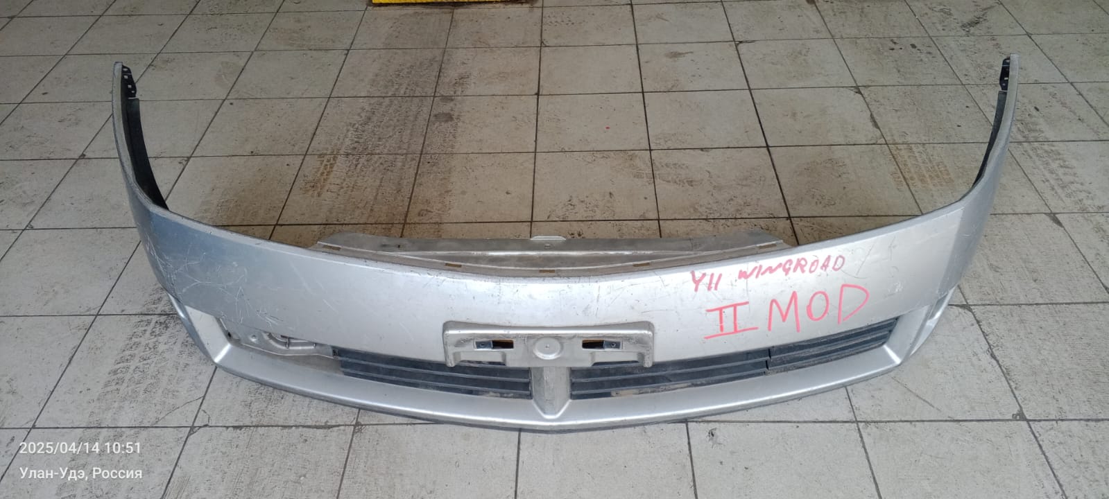 Бампер NIS WINGROAD Y11 (03) /2-я модель/серебро/НЕТ правой заглушки туманки [б/у]