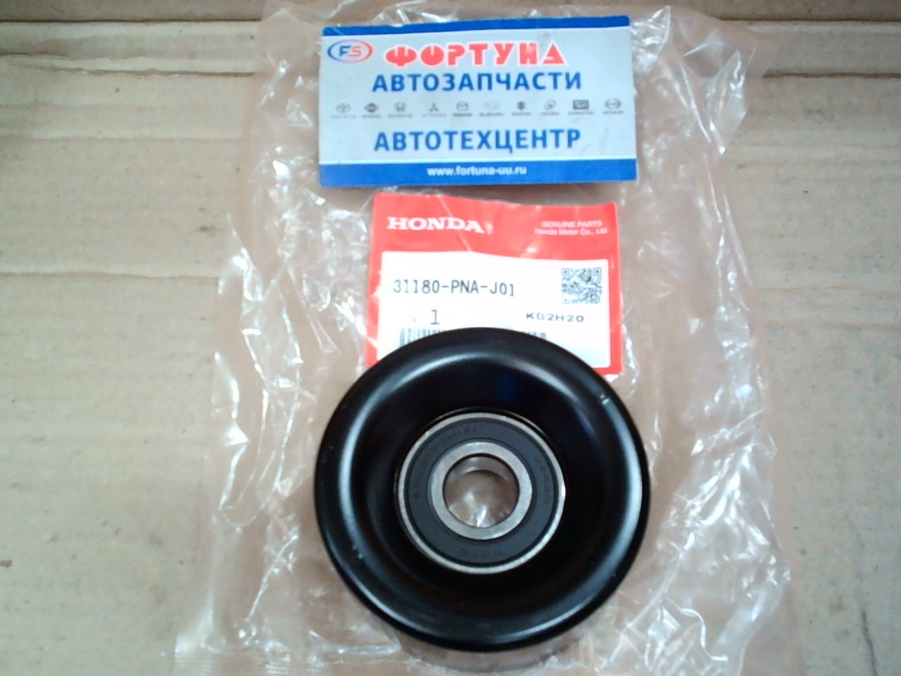 Ролик натяжной ГРМ 31180-PNA-J01 HONDA /K20A -AC/