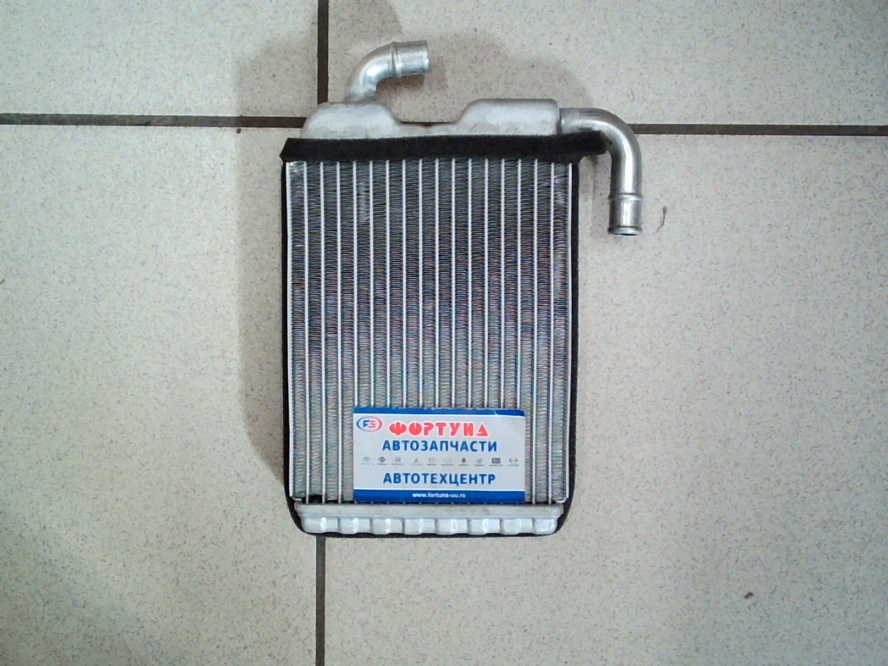 Радиатор печки HTR-310 /MAZDA  [W222-61A10] (147x181x32)/ ZEVS