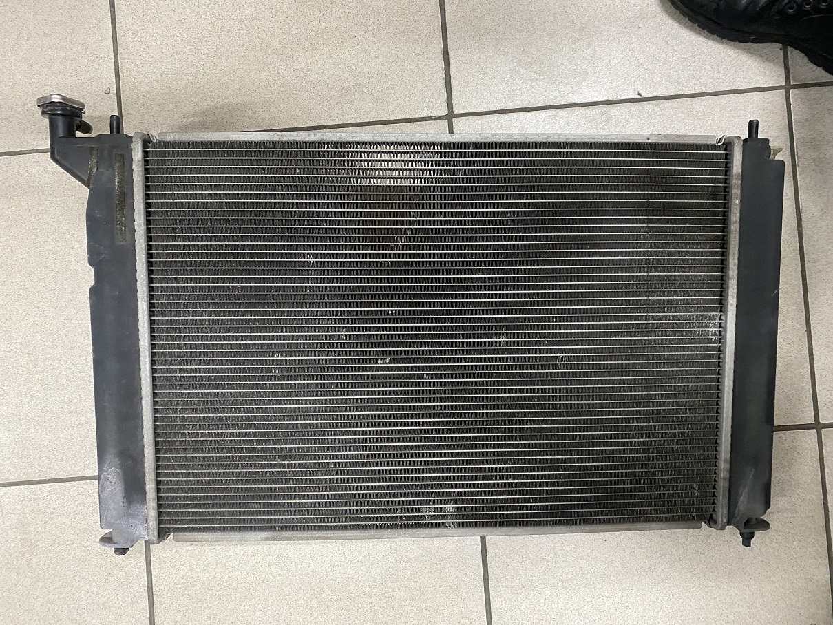 Радиатор TY0002-240-CVT /PREMIO, ALLION 240, WISH,  CALDINA 241 '01-'06/для CVT /без охлаждения для АКПП/ [б/у]