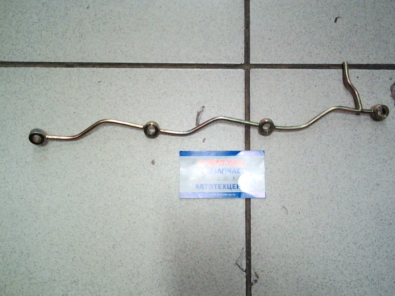 Трубка обратки 23760-56060 TW /11B, 14B/