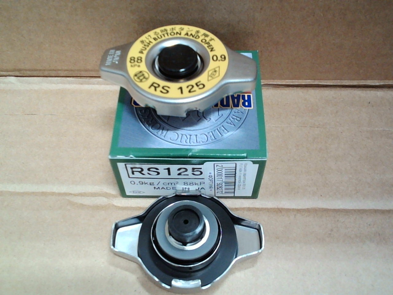 Крышка радиатора RS125 FUTABA /с кнопкой сброса давления 0.9 ходовая d=14/