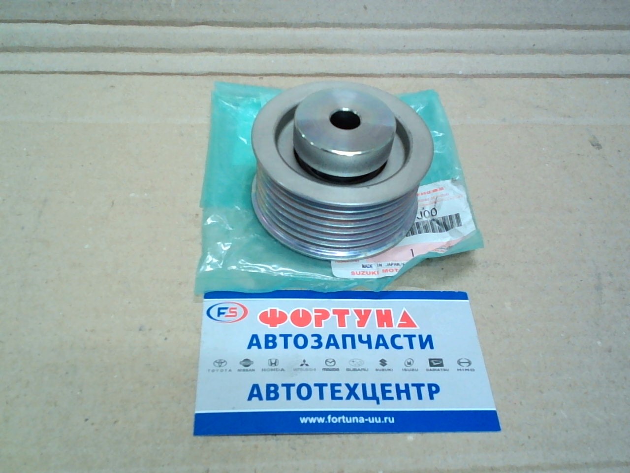 Ролик натяжения генер. 49160-67J00 SUZUKI