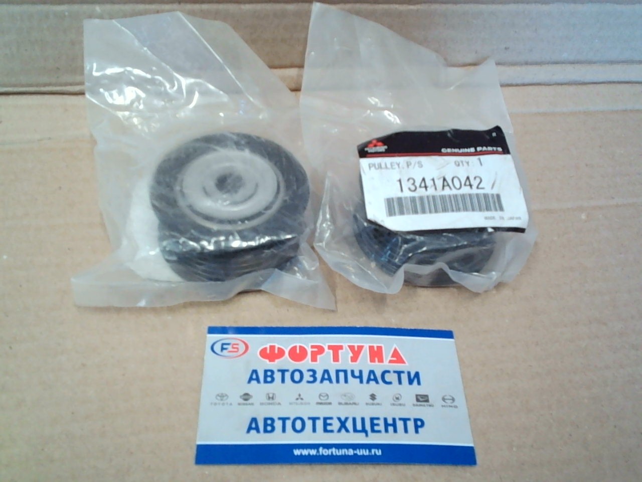 Ролик обводной 1341A042 MITSUBISHI