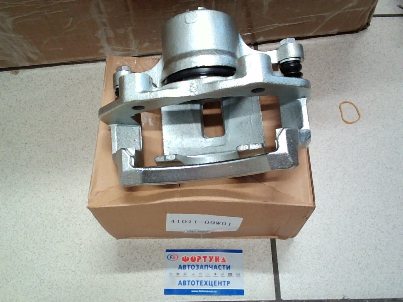 Суппорт тормозной 41011-09W01 TW передний левый /D21 Один поршень/