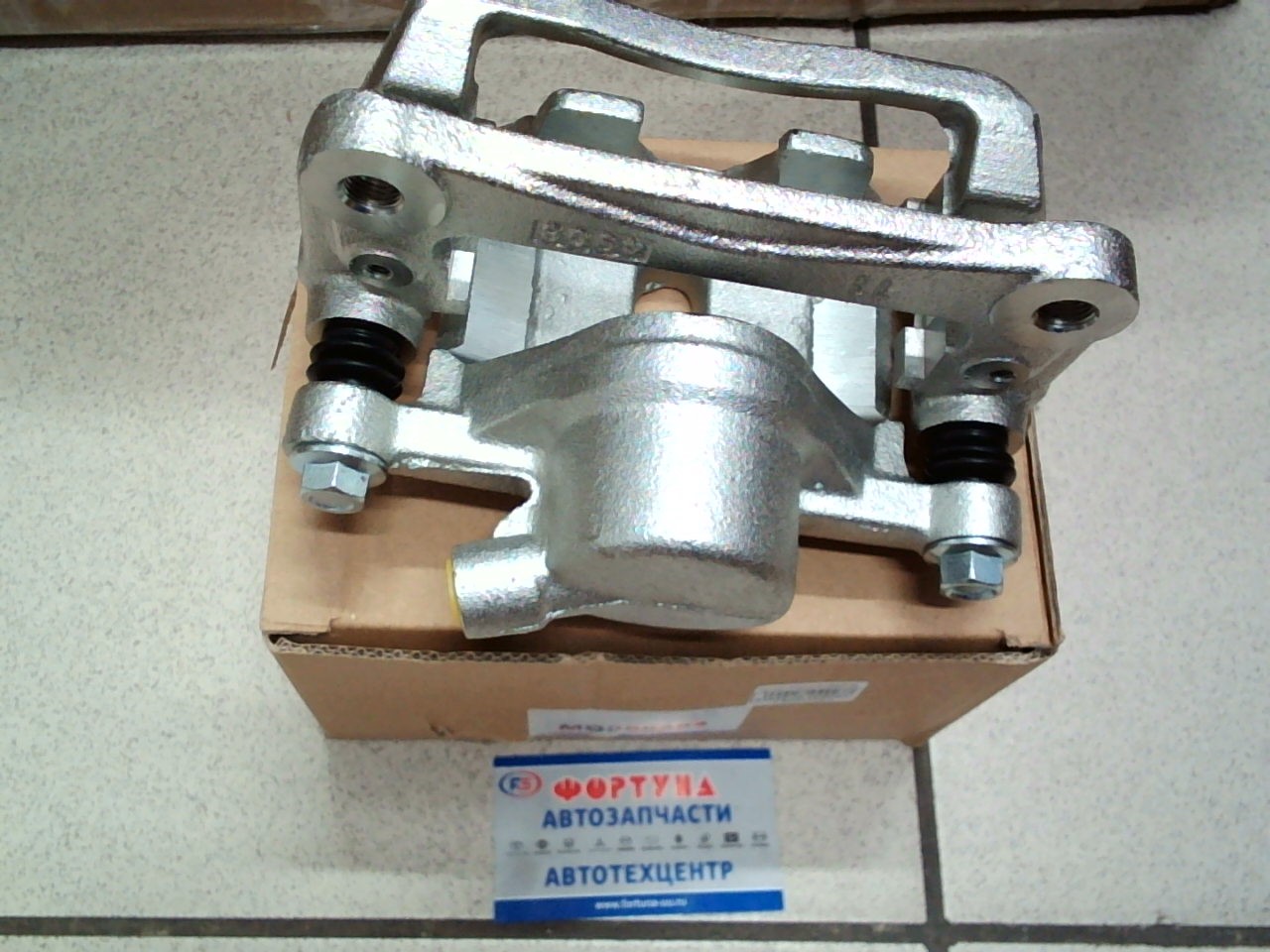 Суппорт тормозной MB858464 TW задний левый /PAJERO V4#,  V2#/