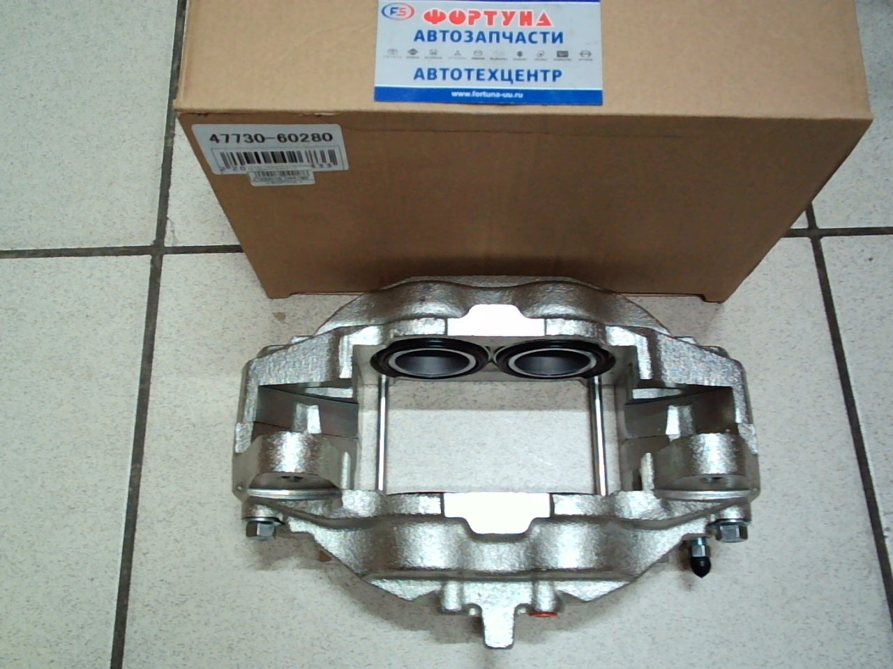 Суппорт тормозной 47750-60280 TW передний левый /L.C URJ200/