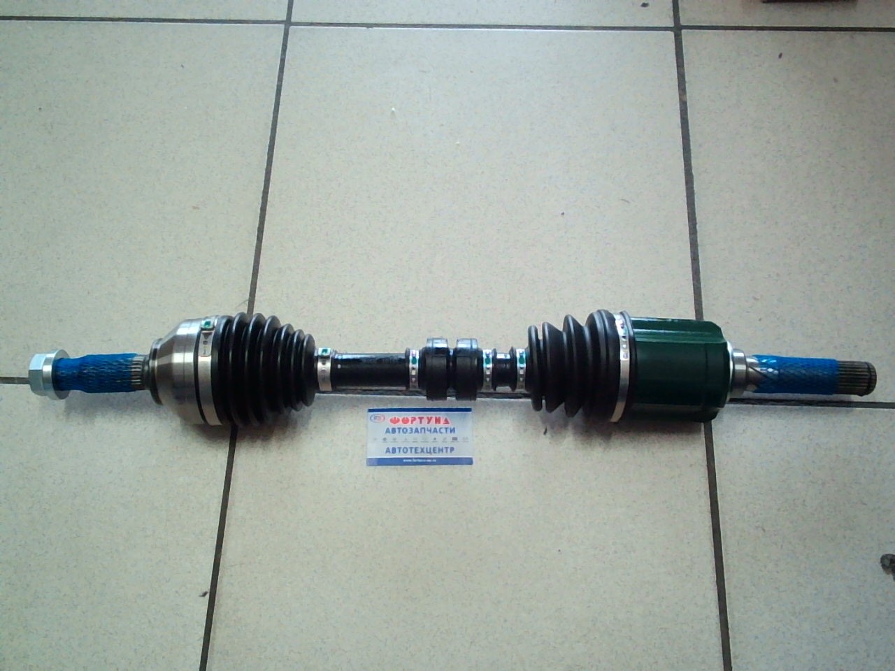 Вал Приводной в сборе 39101-JG04C TW /Левый T31 2.5 4WD CVT 667mm/