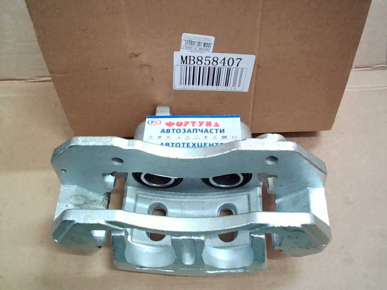 Суппорт тормозной MB858407 TW передний правый /PAJERO V4#,  V2#/