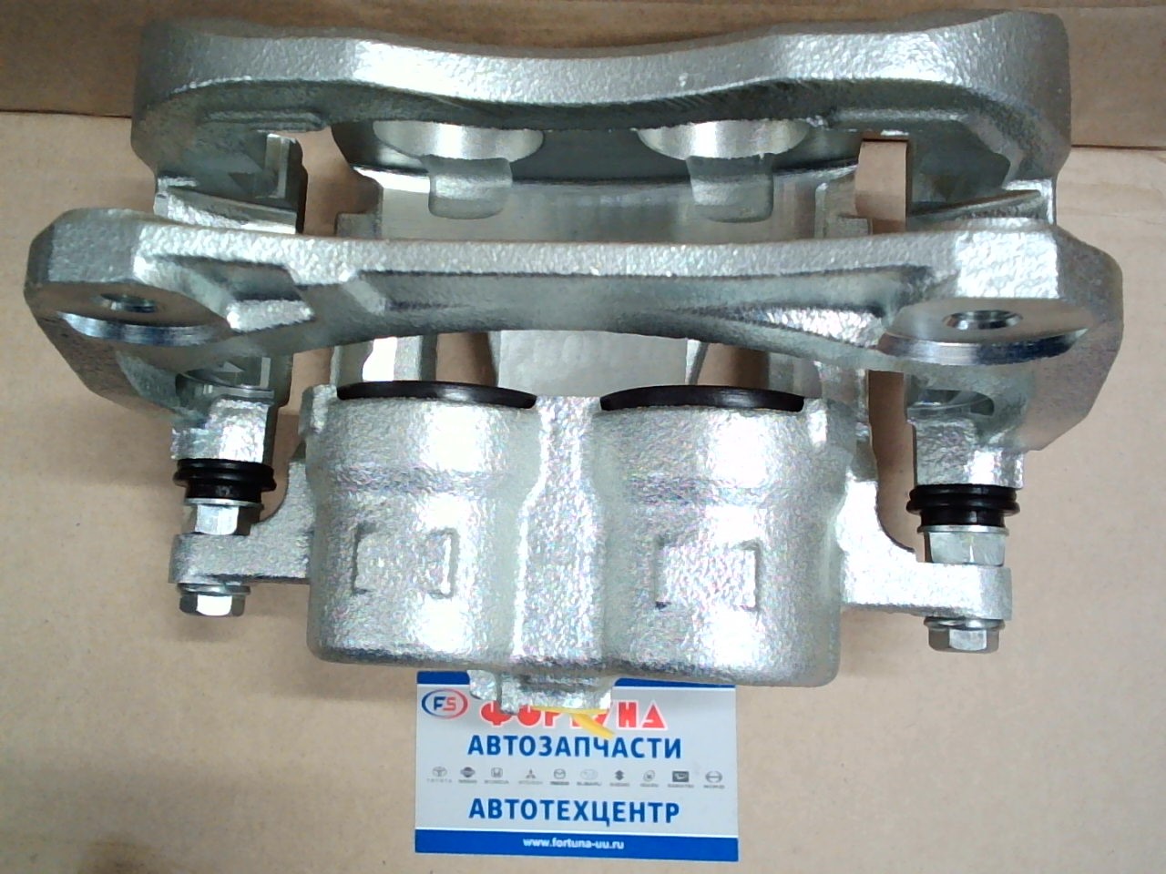 Суппорт тормозной 47750-48150 TW передний левый /HIGHLANDER,  KLUGER GSU4#/