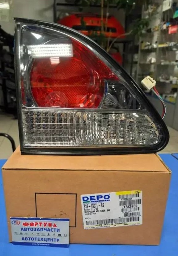 Вставка на крышку багажника HARRIER/LEXUS RX300 312-1307 L (01-03) DEPO